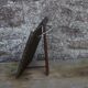 Oriental mirror in chiseled metal – beveled, for placing on a surface or hanging