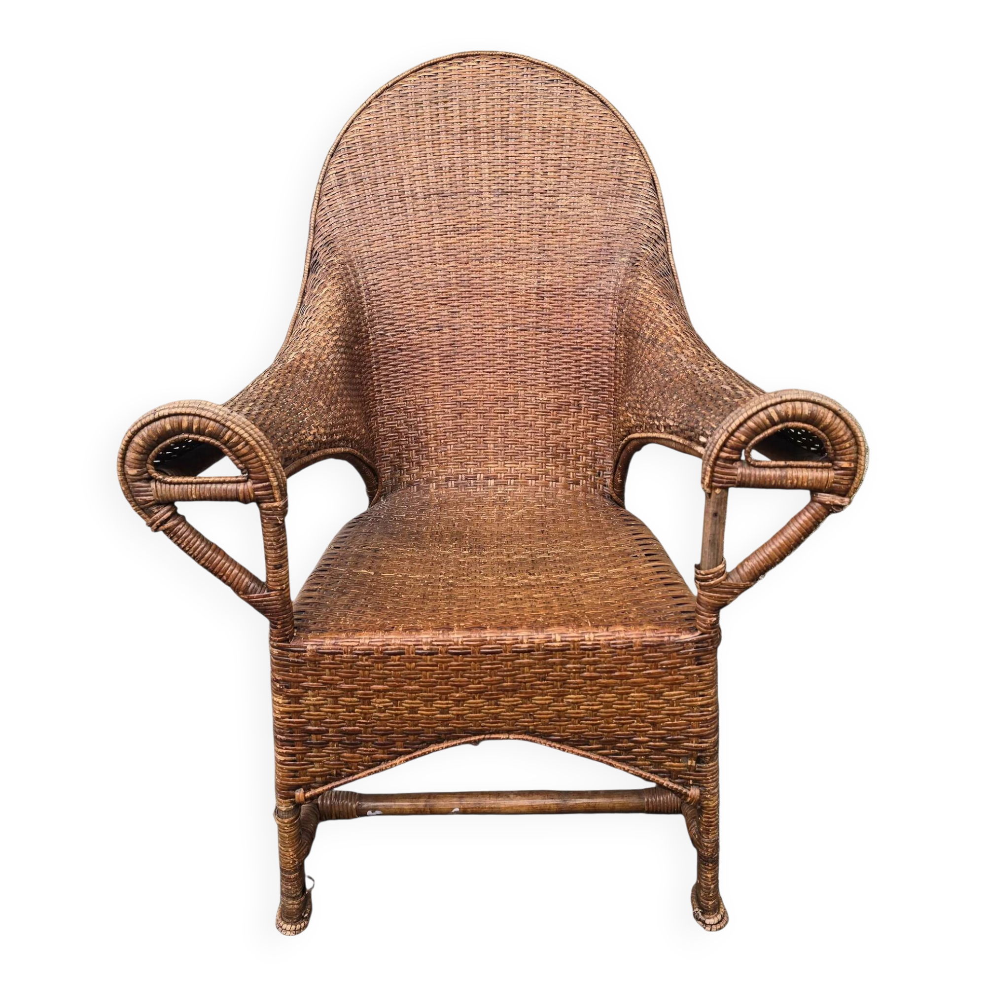 Arts & Crafts armchair in wicker and rattan attributed to Dryad & Co, UK, circa 1920.