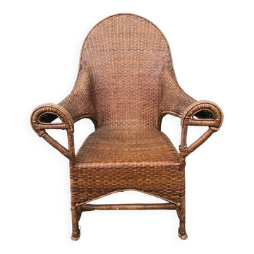 Arts & Crafts armchair in wicker and rattan attributed to Dryad & Co, UK, circa 1920.