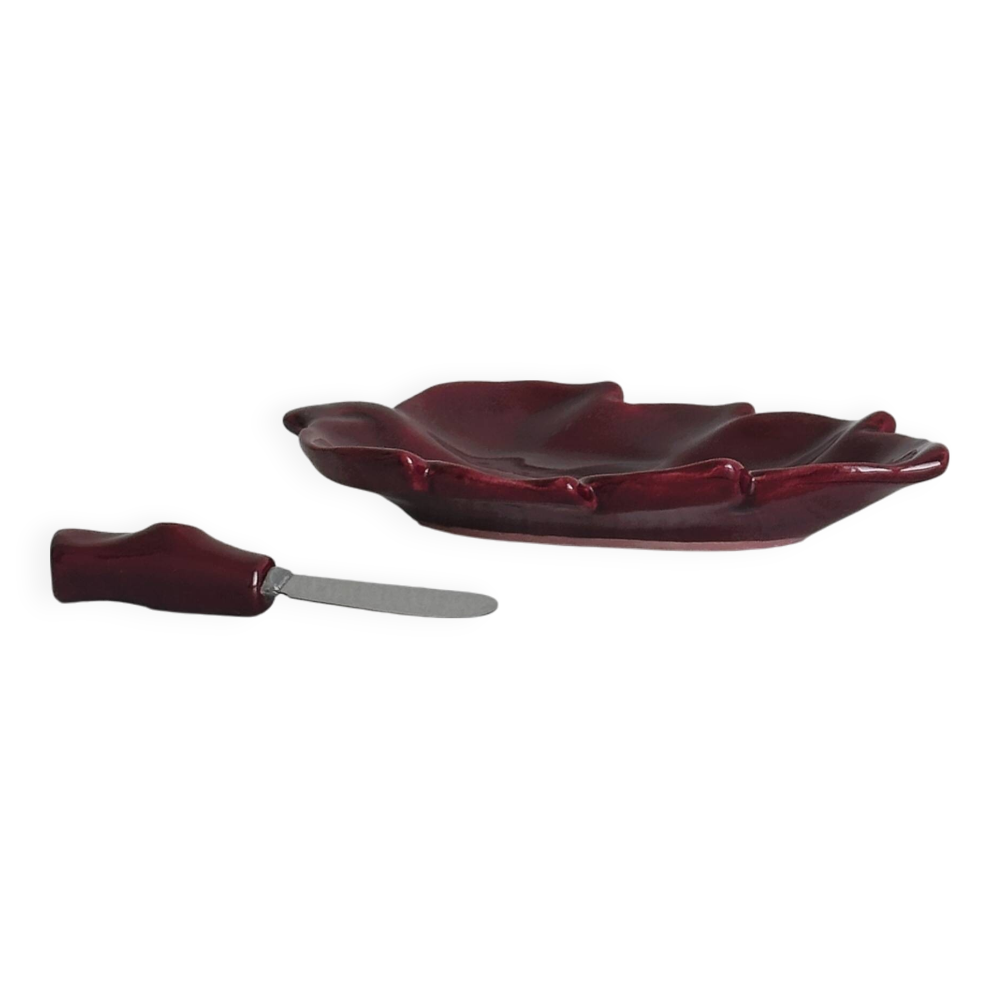 Red ceramic butter dish with knife