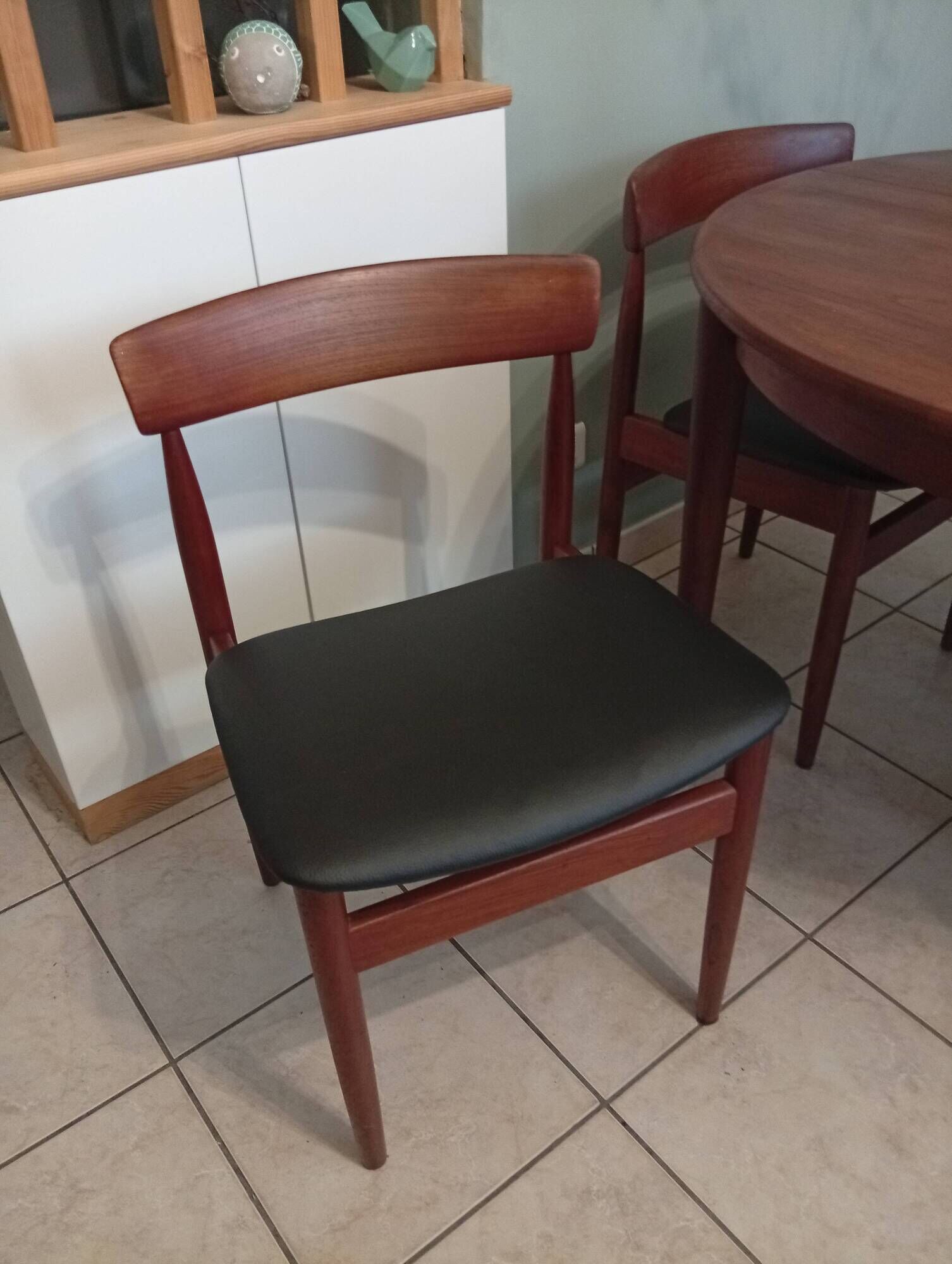 Four Danish mid-century teak armchairs.