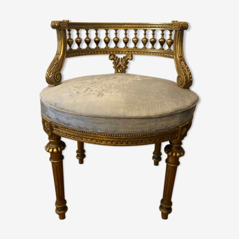 Louis XVI gilded wooden armchair