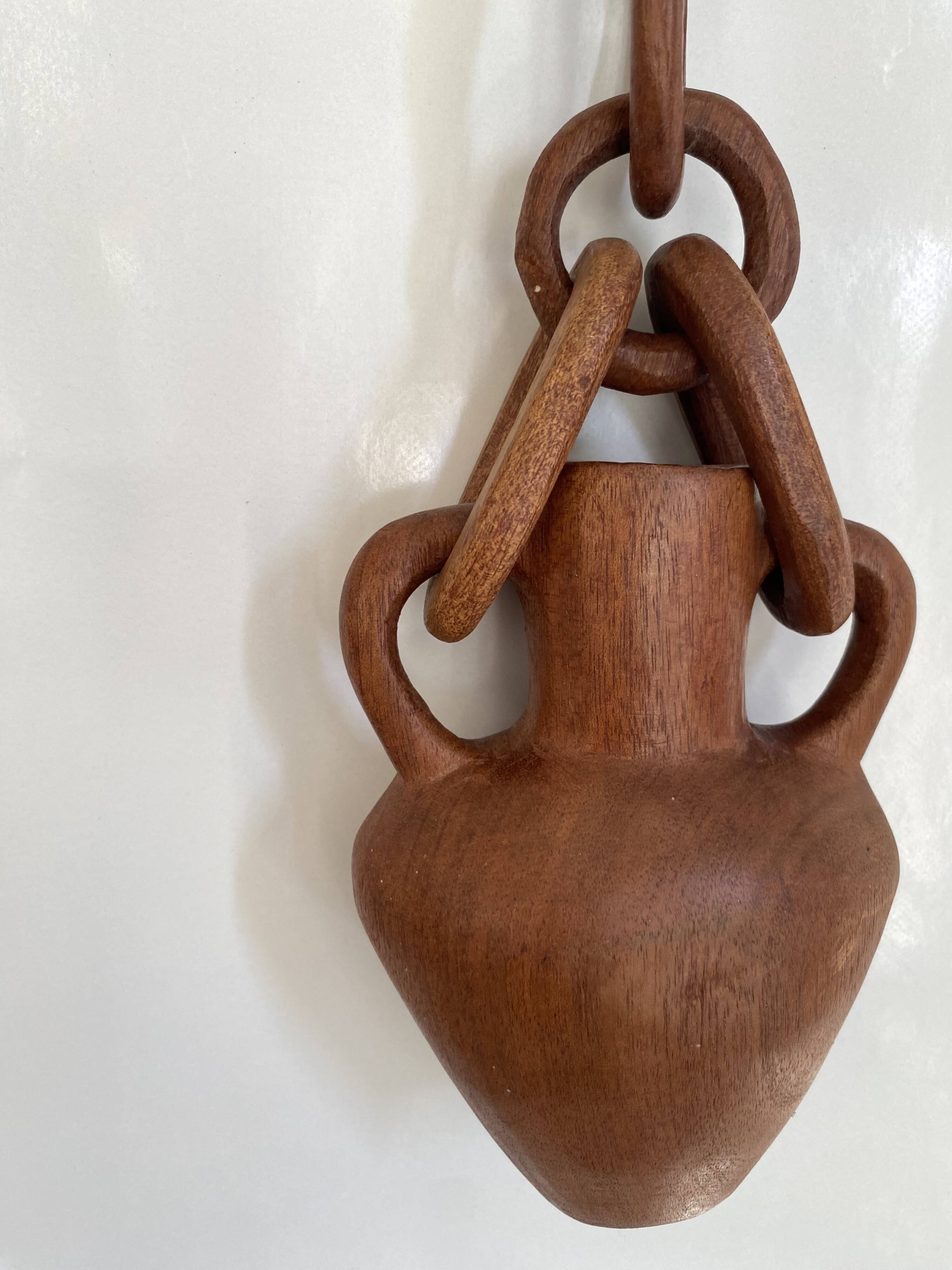 Vase and wooden chain to hang