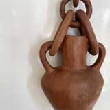 Vase and wooden chain to hang