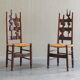 2 sculptural brutalist high-back chairs