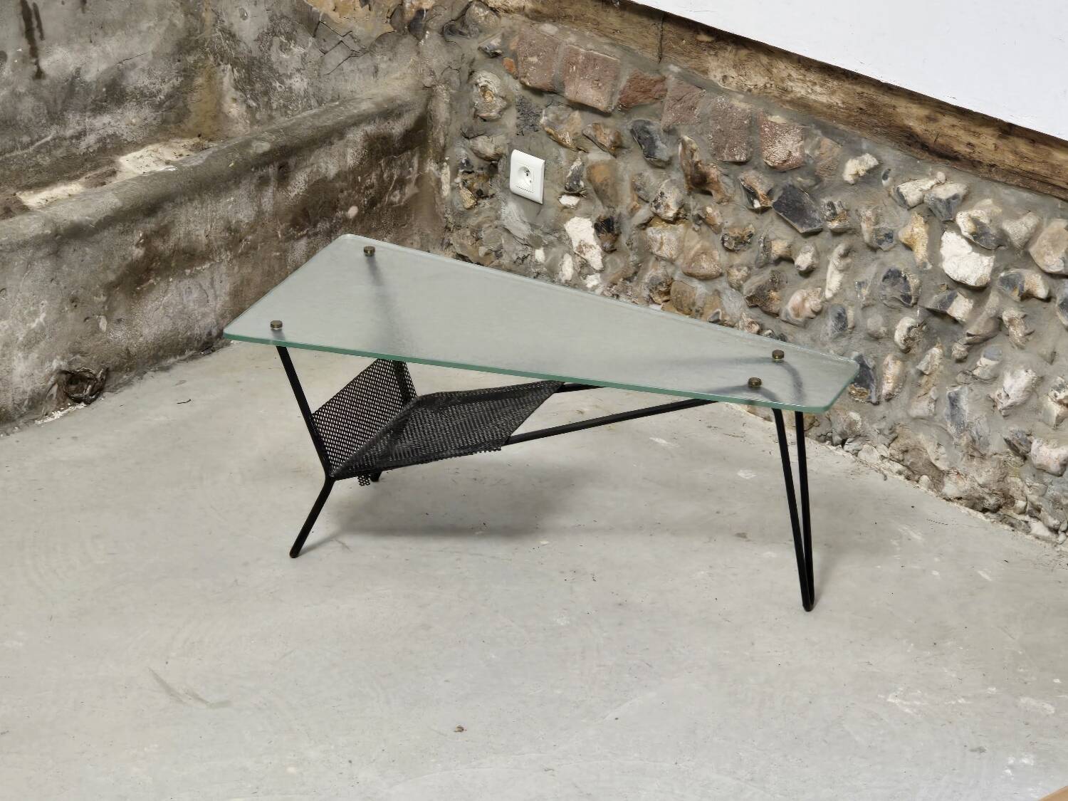 Coffee table in glass and black lacquered metal