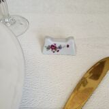 Set of 12 porcelain knife holders with flowers