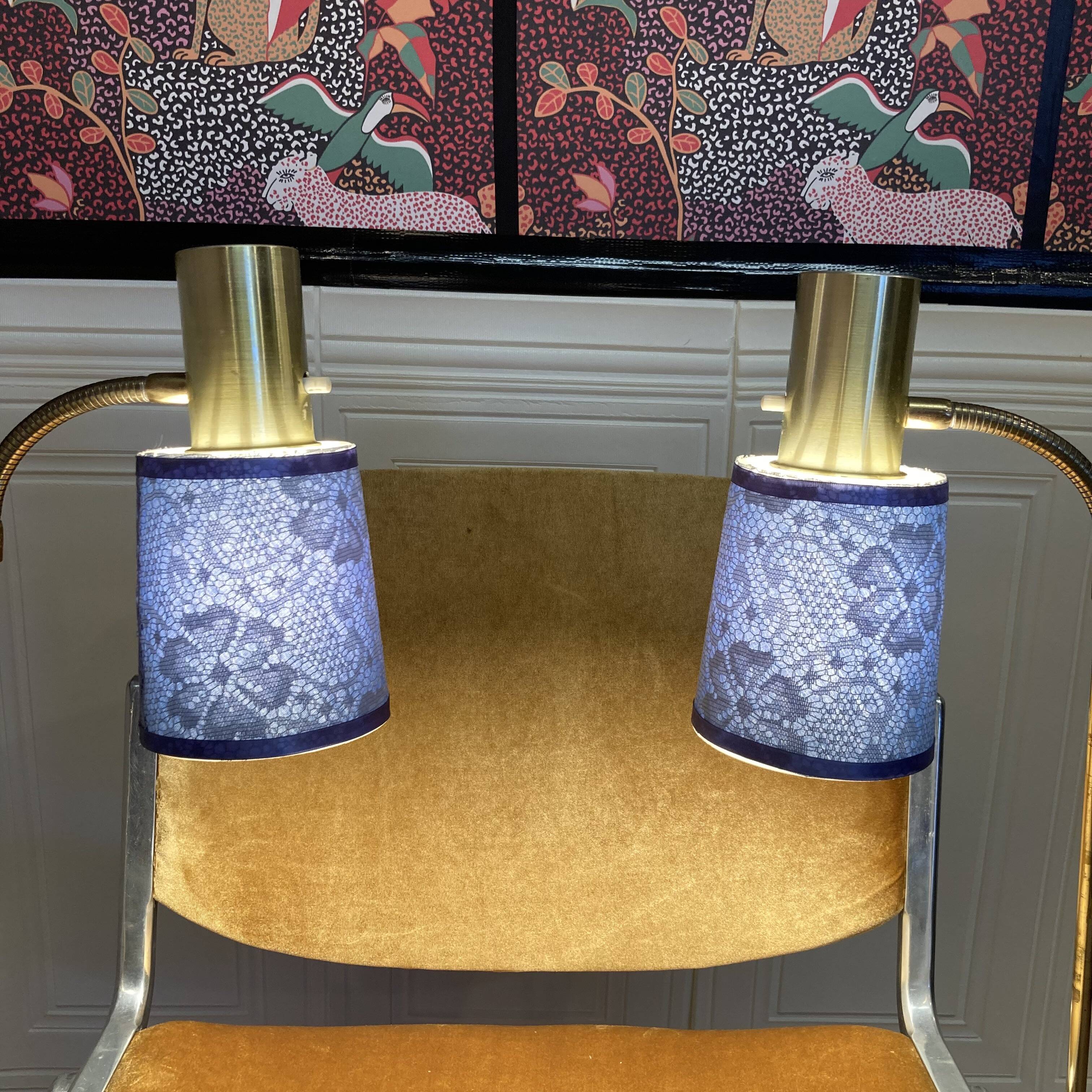 Pair of large modular industrial lamps from the 1950s.