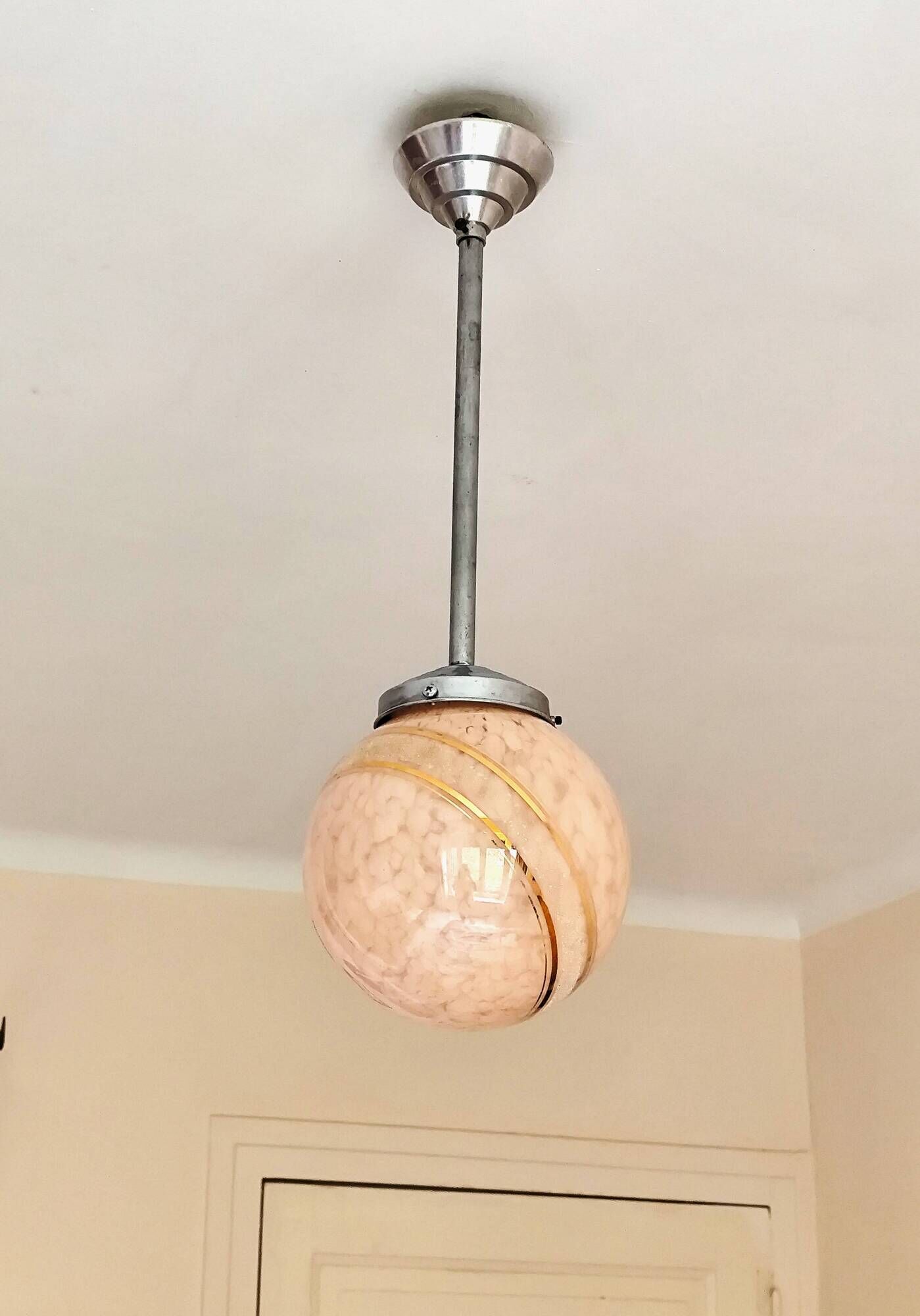 suspension glass globe pink and gold on a metal aluminium stem and structure