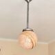 suspension glass globe pink and gold on a metal aluminium stem and structure