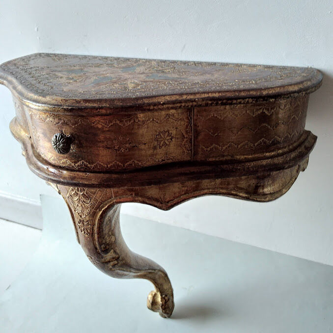 Small golden florentine console