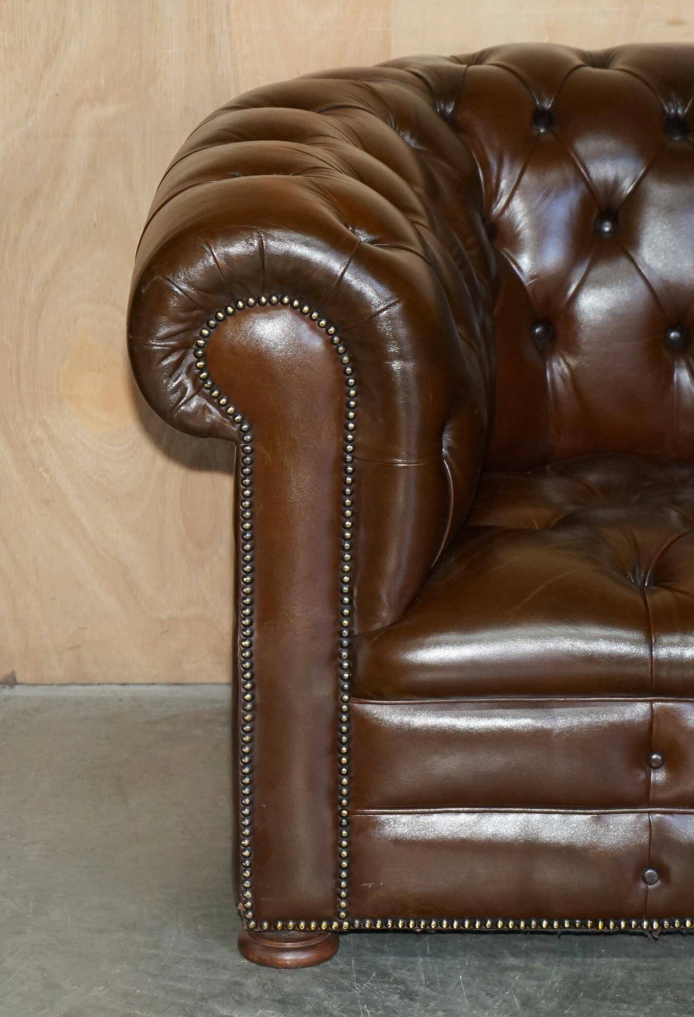 Restored Chesterfield leather sofa in vintage Art Deco style