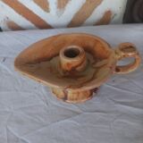 Vintage candle holder in the shape of a stylized Aladdin lamp