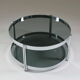 Round chrome-plated metal coffee table and smoked glass tops, France 1970s