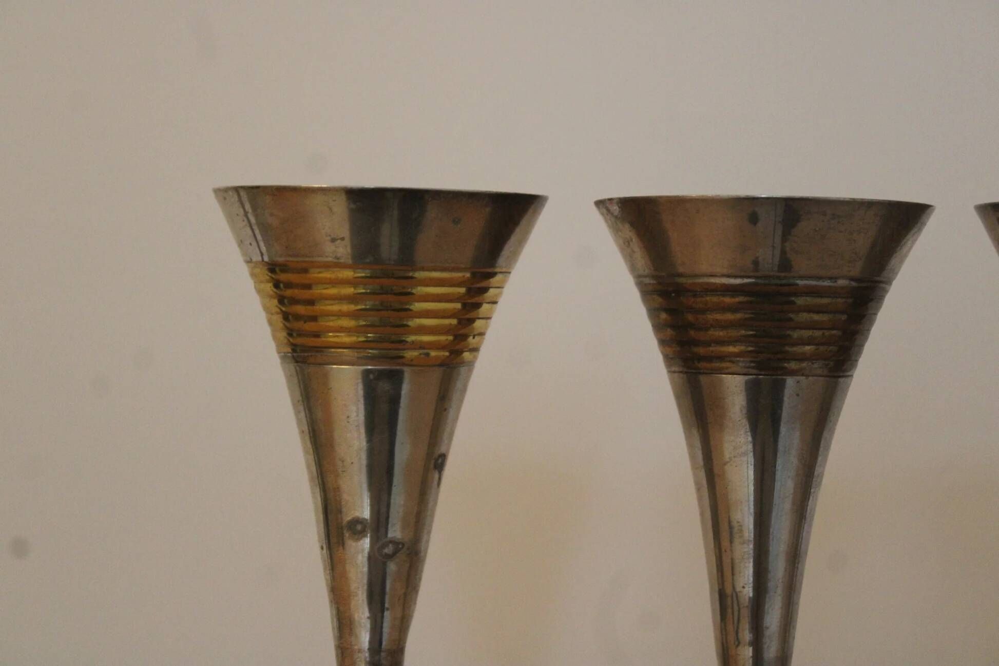 Set of 3 vintage silver-plated and gold footed cups.