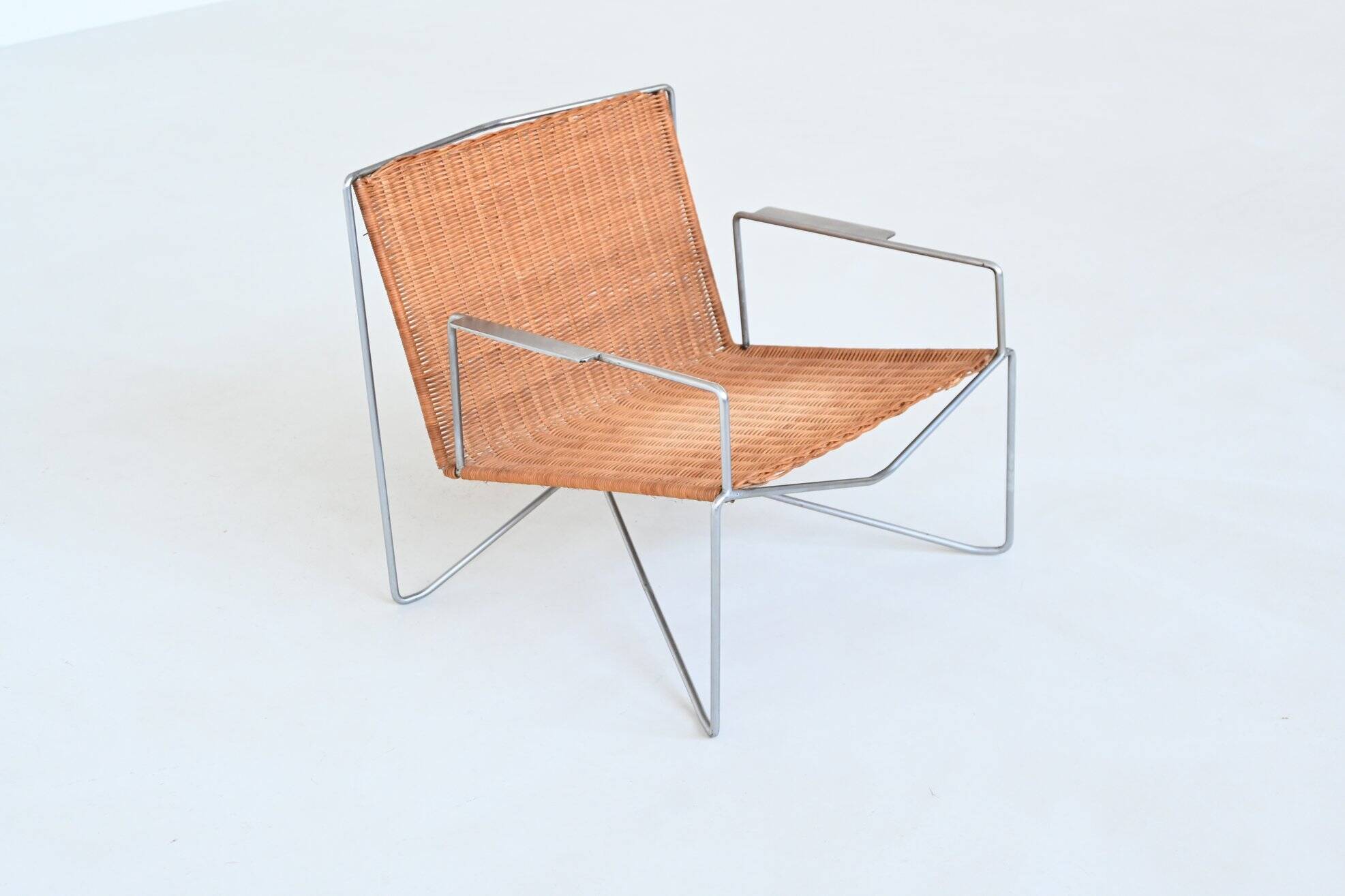 Pair of lounge chairs steel and rattan Gelderland The Netherlands 1964