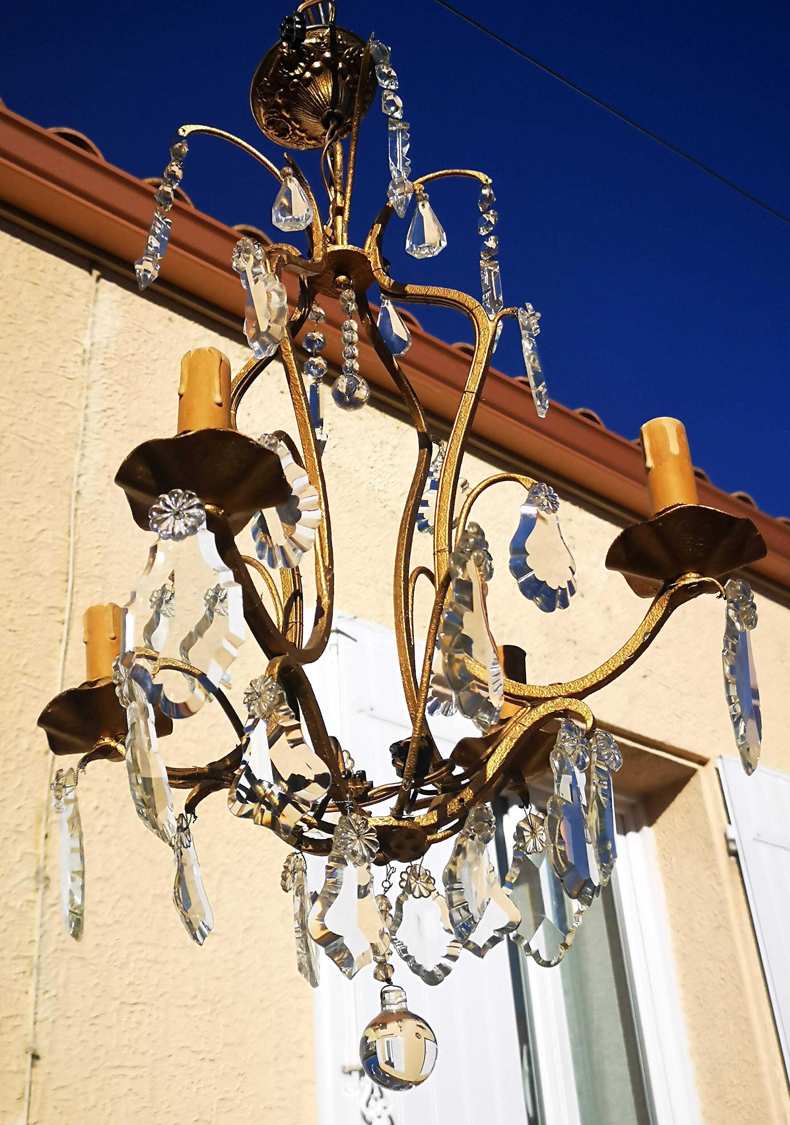 Wrought iron chandelier with pendants