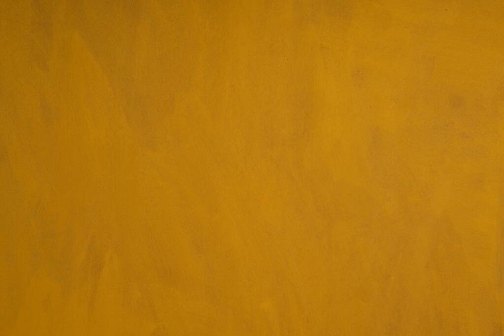 Golden brass mirror in the style of Gio Ponti. 1980s or 1990s.