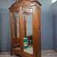 antique walnut carved wardrobe – Louis XV style – mirror doors – 19th century