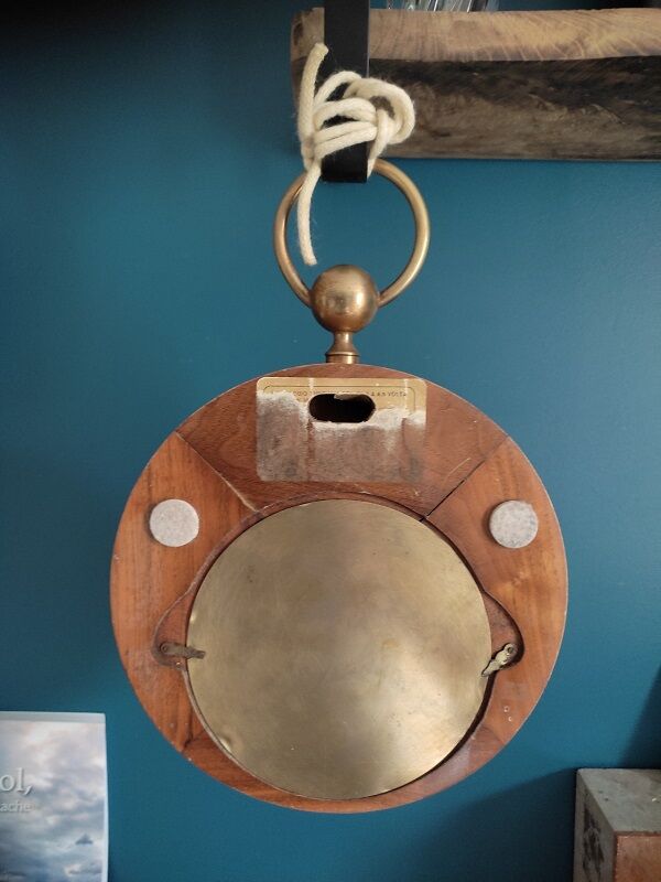 Patinated inlaid wooden clock shape watch pocket