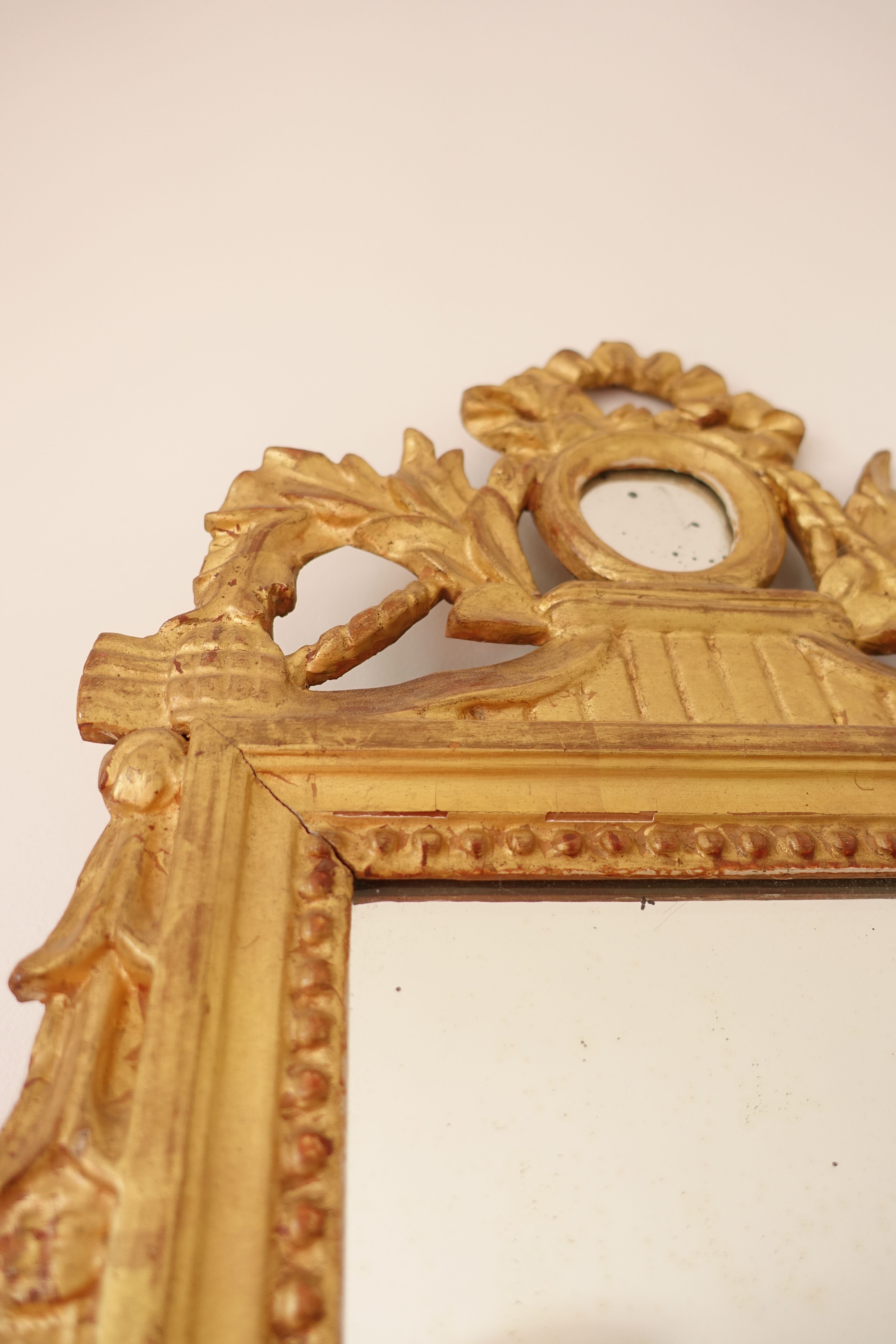 Miroir Louis XVI en bois doré 35x 65cm
