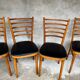 Set of 4 vintage wooden chairs with faux leather.