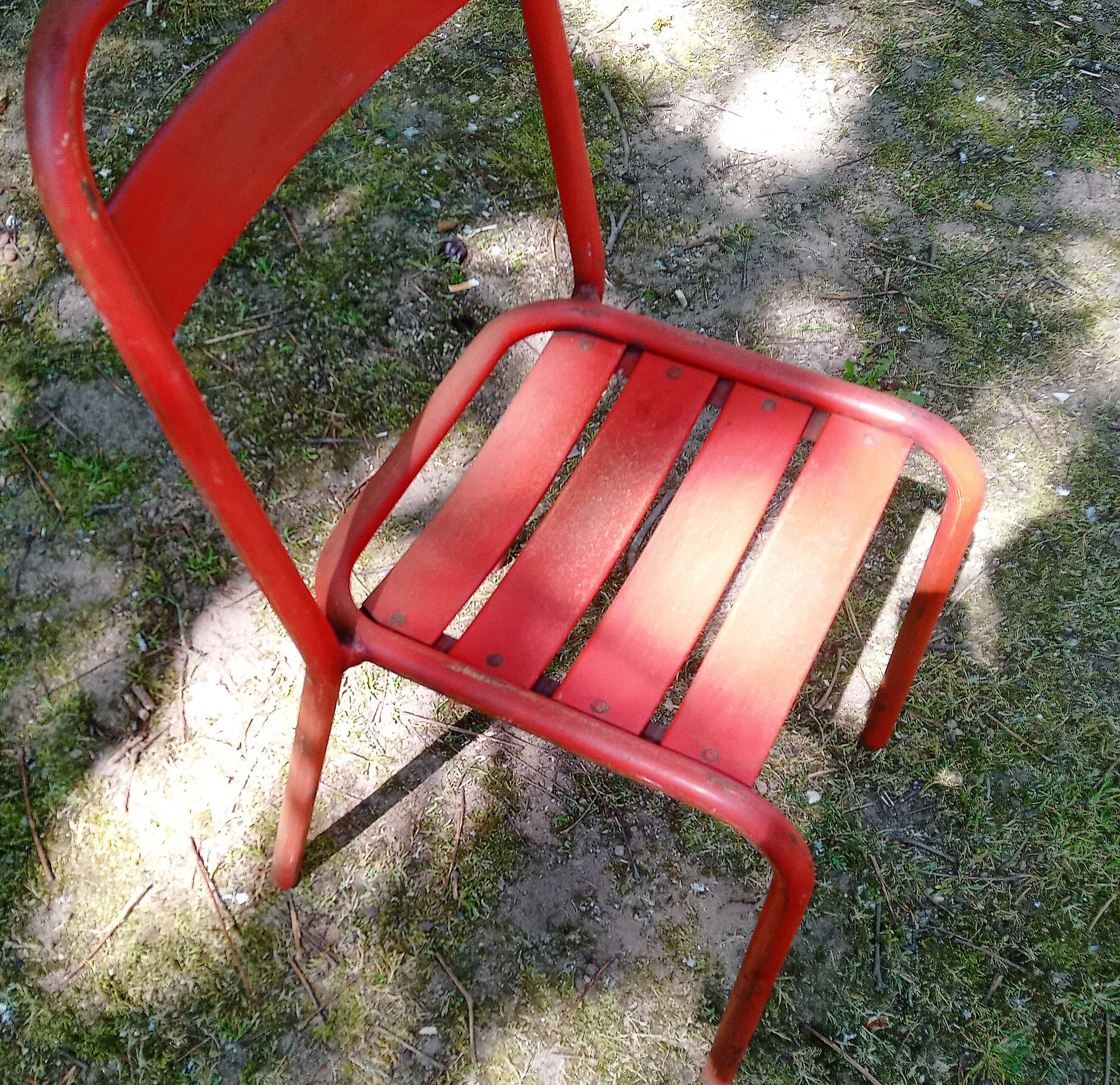 Series of 8 red Tolix chairs