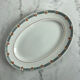 Oval presentation plate Saint Amand with bicolour floral decoration.