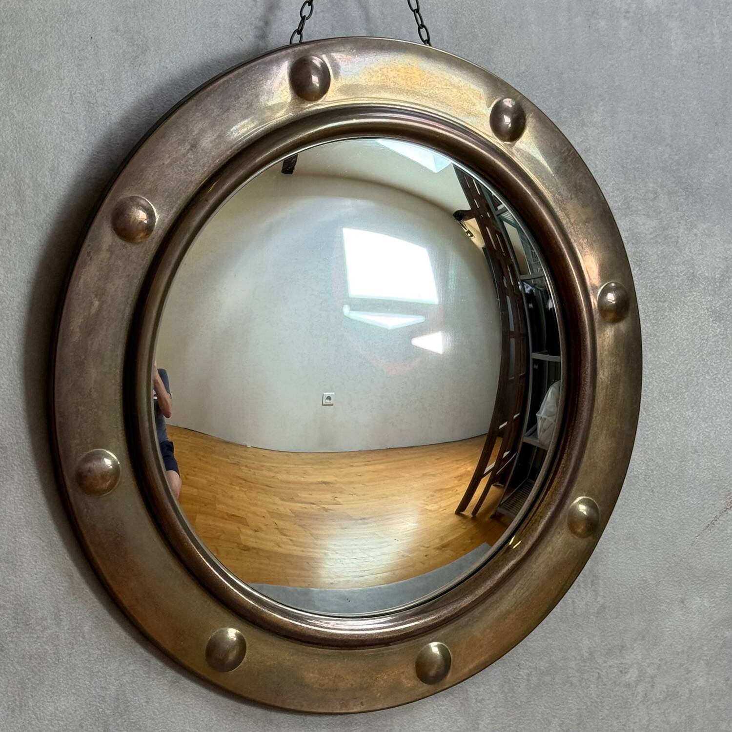 50s French porthole-style witch mirror with convex glass.
