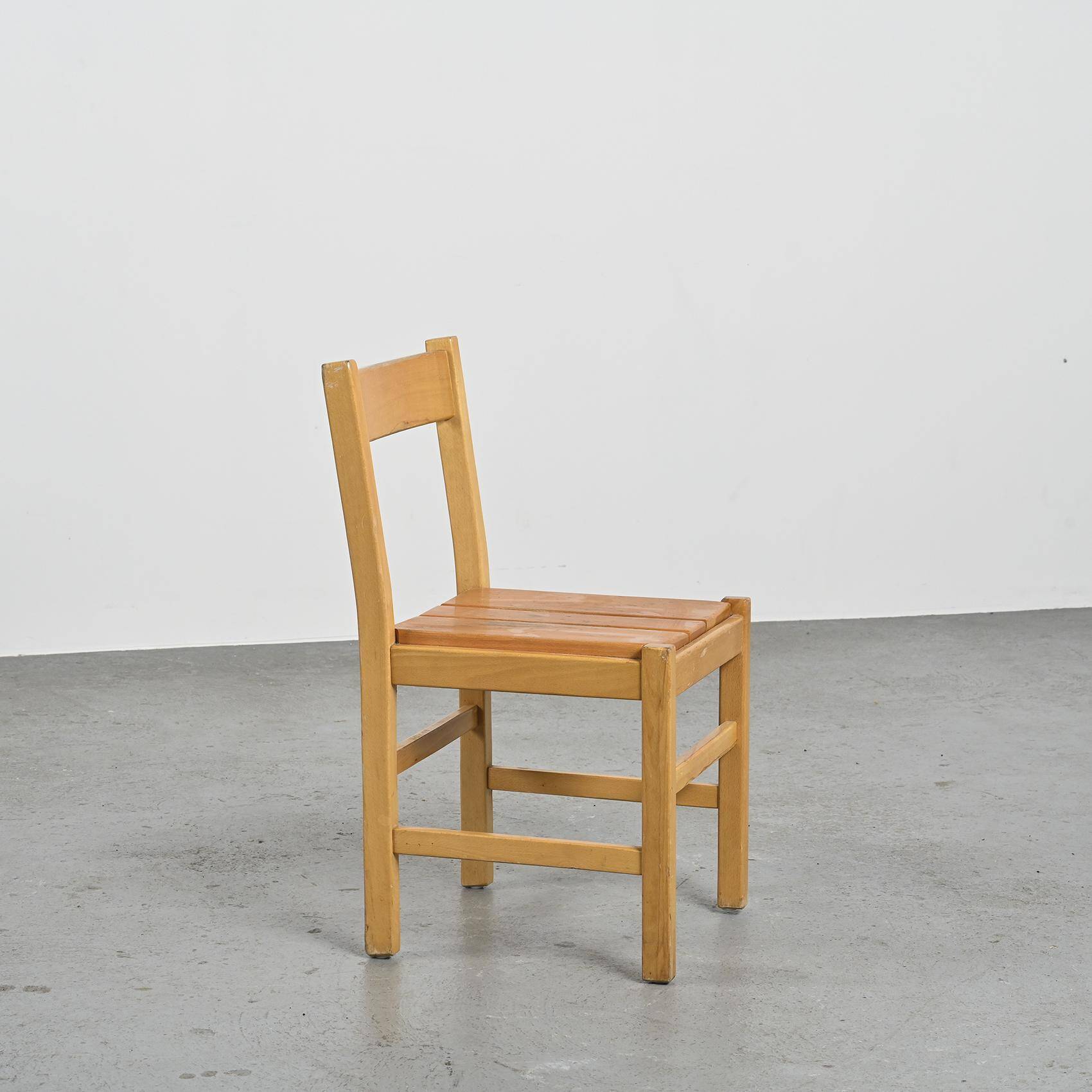 Suite of four chairs in the style of Maison Regain