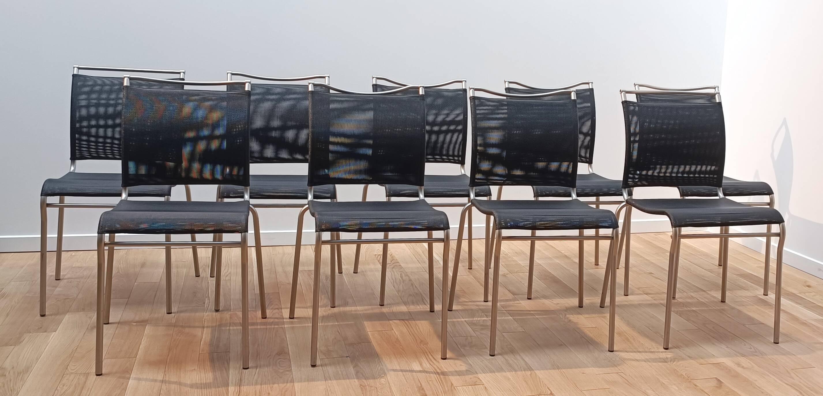 Suite de 8 chaises Air CB93, Calligaris