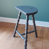Bluish-grey tripod stool