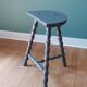 Bluish-grey tripod stool