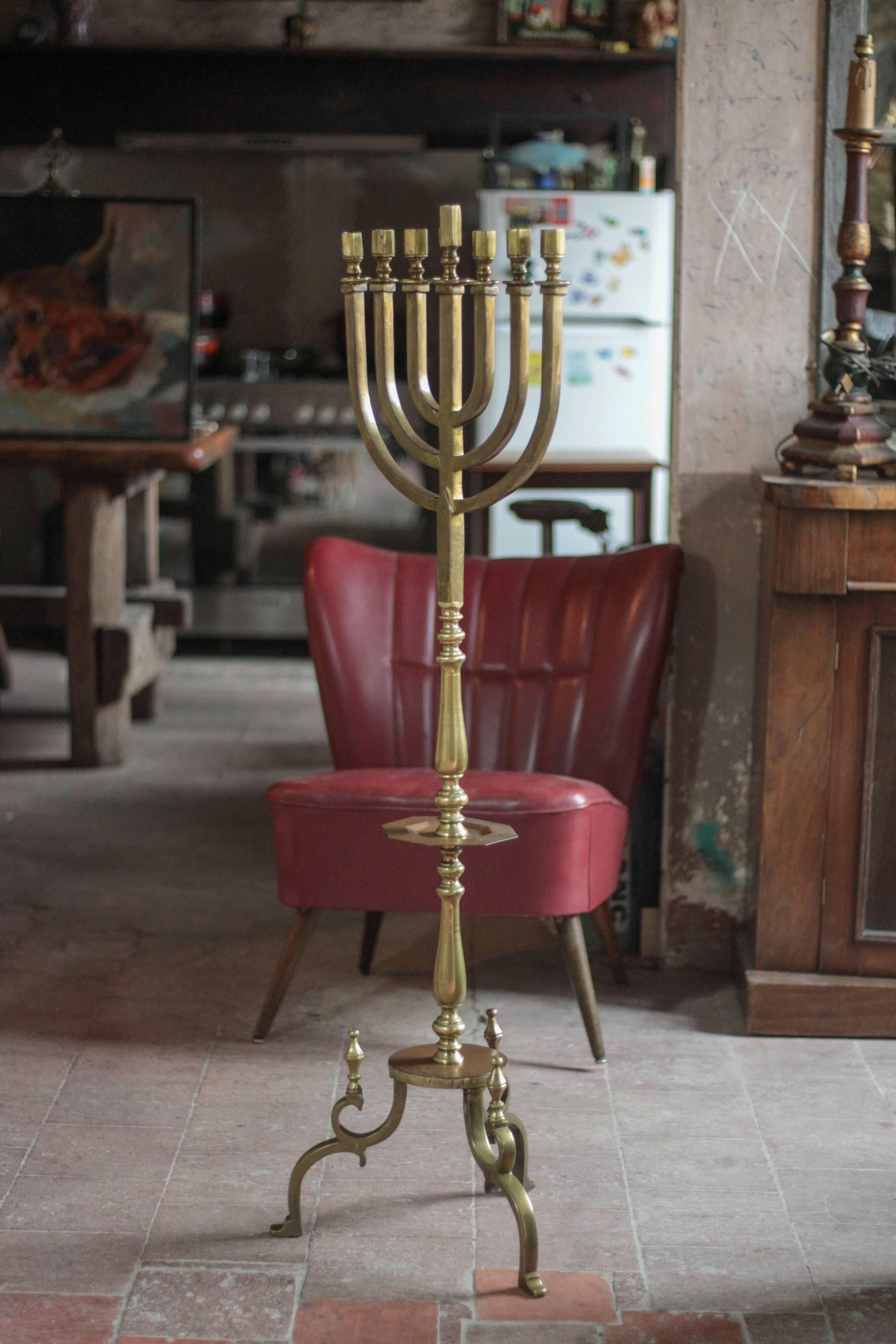 Golden bronze chandelier with seven arms, Menorah, candlestick on a stand, candelabrum.