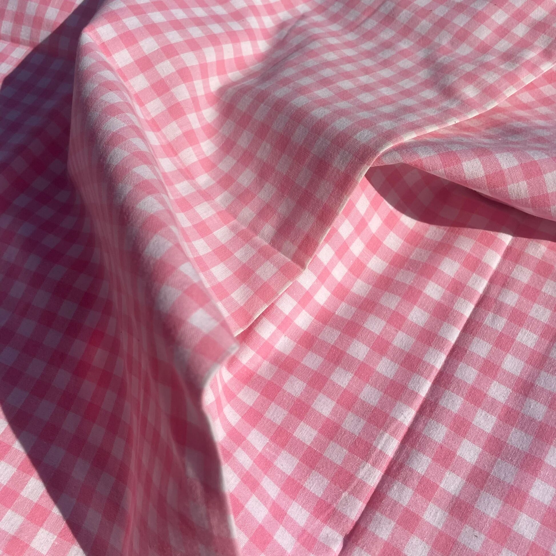Pink checked cotton bolster cover