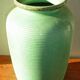 Enamelled earthenware vase with striated pattern