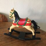 Cheval à bascule en bois