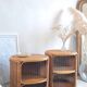 Pair of wicker bedside tables circa the 1970s.