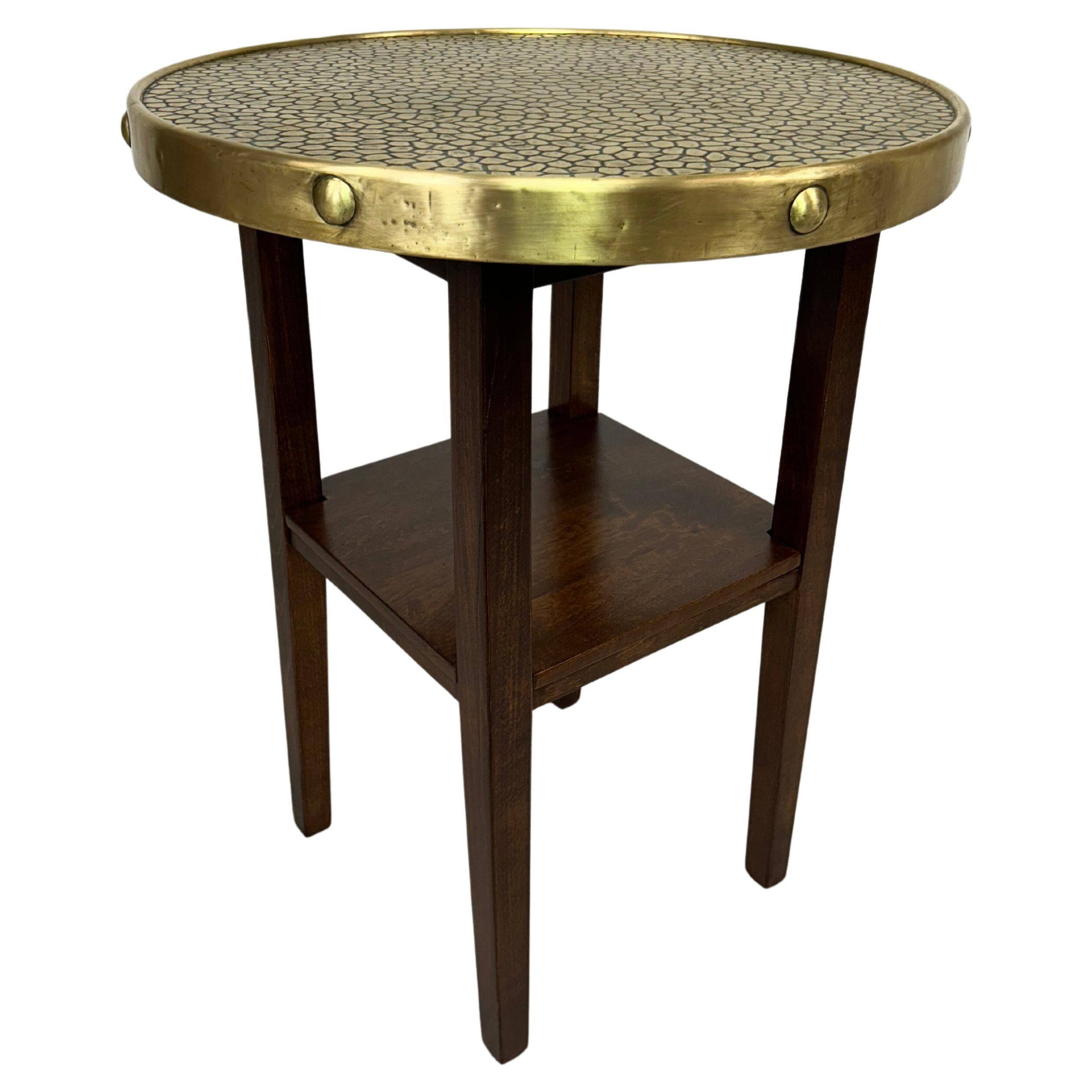 Secession coffee table with a brass top