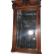 Bevelled mirror in carved wood