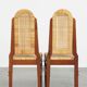 4 wooden Art Deco design dining chairs with a wicker seat and backrest