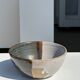 White and glossy brown two-tone ceramic bowl, matt earth