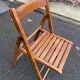 2 vintage folding wooden chairs