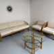 Complete living room with rattan sofa and white bouclette, brass finish, 80's design