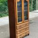 Vitrine Louis XV en bois signée Riskoff