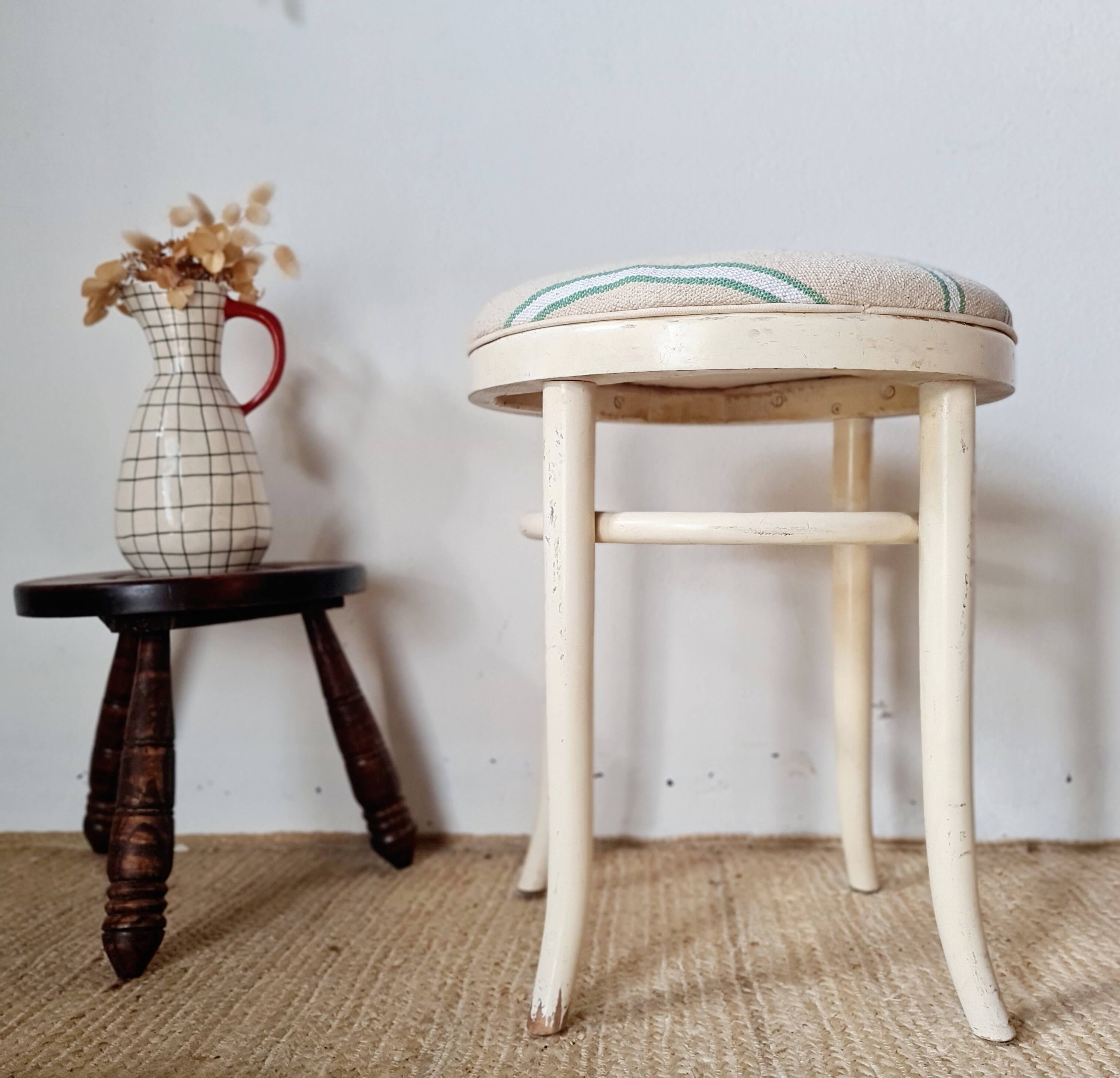 Vintage curved wooden stool in Baumann style, striped fabric seat.