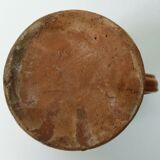 Old pitcher pot in glazed earth