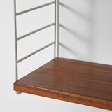 "Hylla" wall shelving system in teak