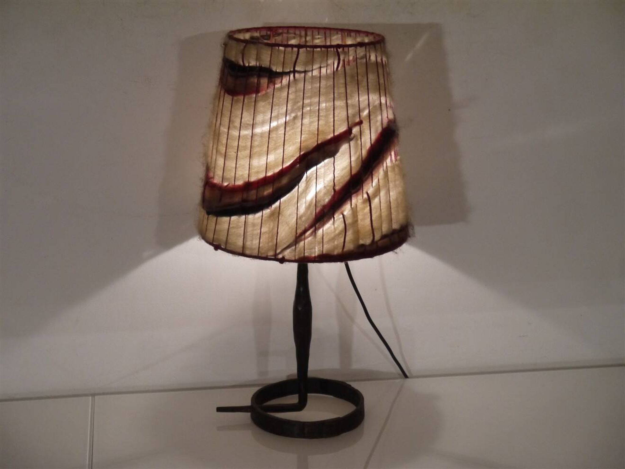Brutalist hammered iron lamp from the 1950s.