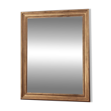 Large gold-framed mirror with bevelled glass.